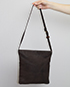 Bolso al hombre, vista trasera
