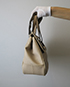 Bolso de mano con bandolera, vista lateral
